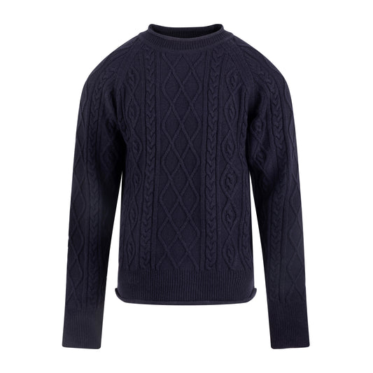 Navy blue cable knit sweater on a white background